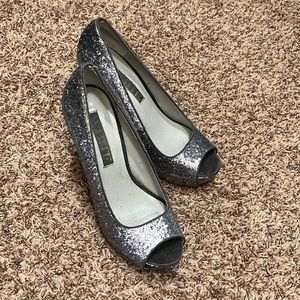 White by Vera Wang US 7.5 sparkly silver peep toe heels. Used condition.